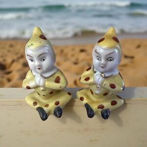 Charming Yellow and White Clown Figurines